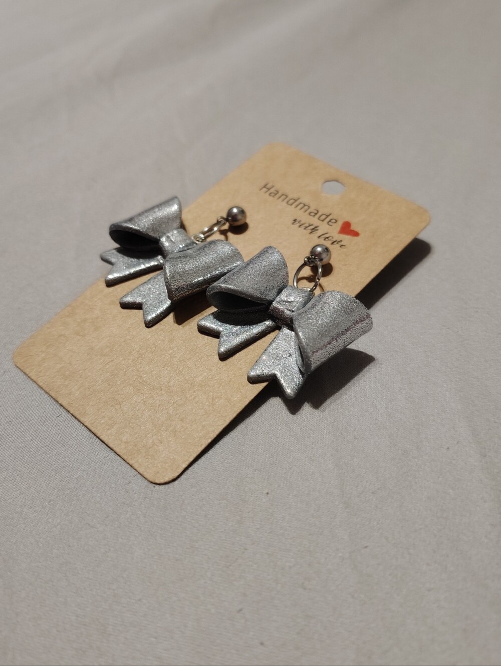 Silver Glitter Bow Dangle Earrings - Picture 3 of 4